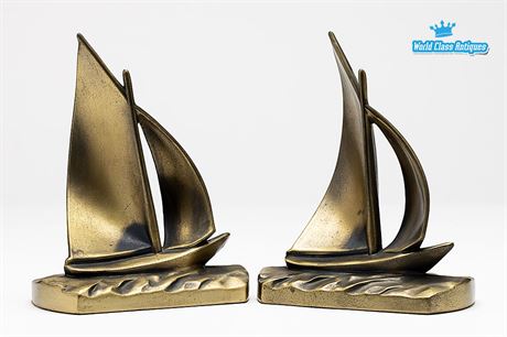 A Beautiful Pair of Vintage Brass Bookends With A Nautical Motif Of Sailboats