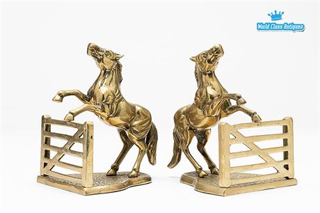 A Beautiful Pair of Vintage Brass Bookends With A Motif Of Rearing Horses