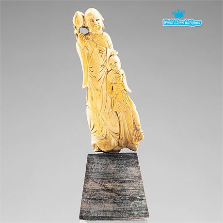 A Chinese Ivory Carving of 'Mother and Child', Qing Dynasty